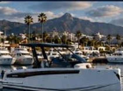 Boat in marina with mountains